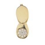 A diamond pendant, depicting a jeweller's loupe.