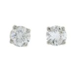 A pair of brilliant-cut diamond stud earrings.Estimated total diamond weight 0.80ct,