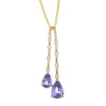 An 18ct gold tanzanite and diamond pendant,