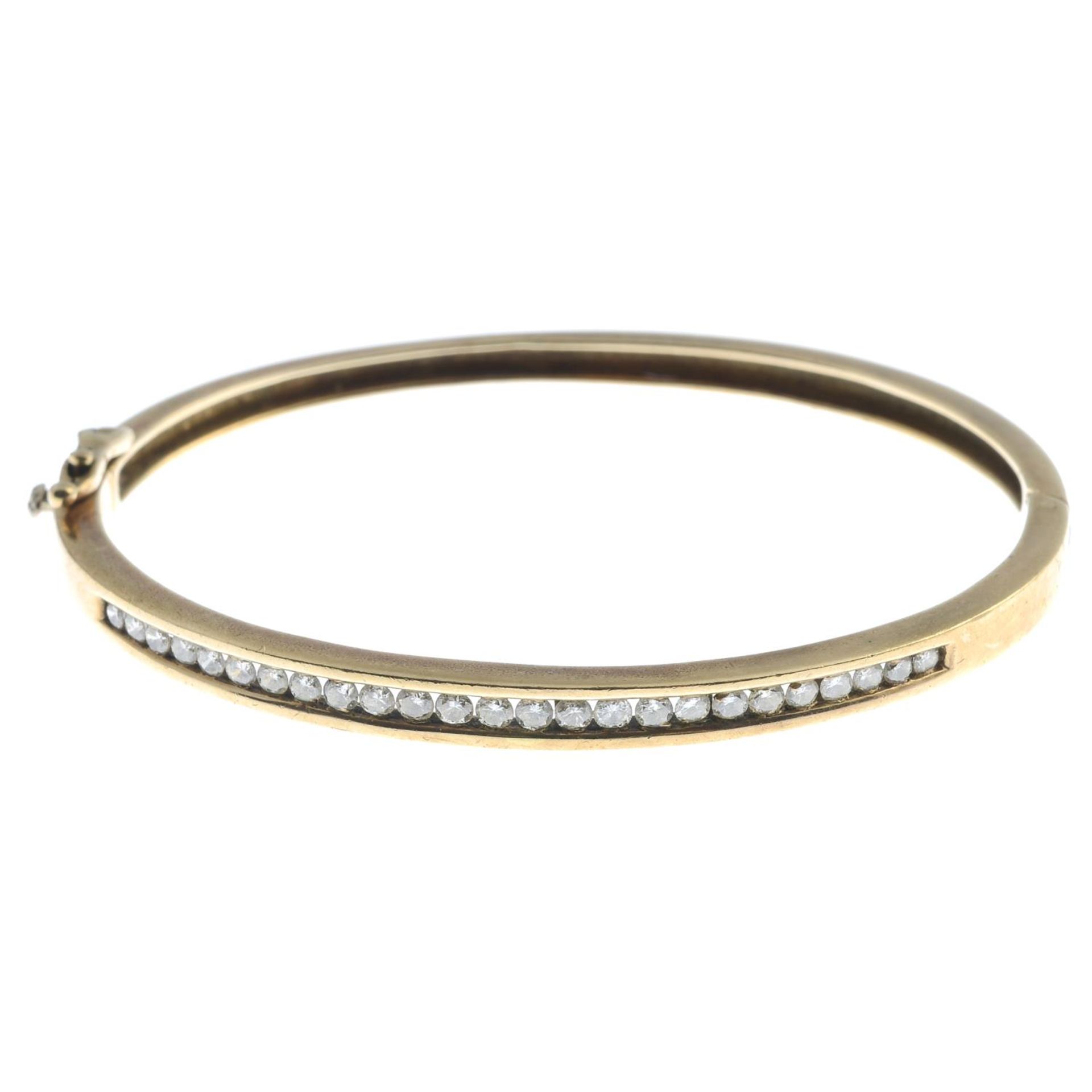 A brilliant-cut diamond bangle,