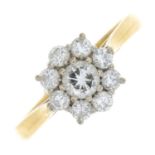 An 18ct gold diamond cluster ring.Estimated total diamond weight 0.60ct,