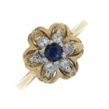 A 9ct gold sapphire and diamond cluster ring.