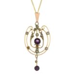 An early 20th century 9ct gold amethyst and split pearl pendant,