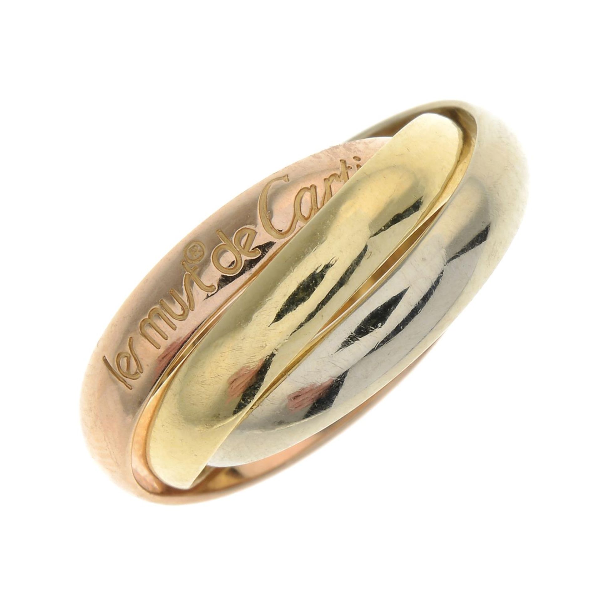 A 'Les Must de Cartier Trinity' ring, by Cartier.Signed Cartier, O0925K.