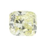 A cushion-shape fancy yellow diamond.