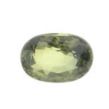 An oval-shape yellowish green sapphire.