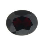 An oval-shape pyrope garnet.