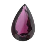 A pear-shape rhodolite garnet.