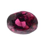 An oval-shape natural red spinel.