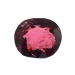 A cushion-shape natural red spinel.