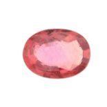 An oval-shape East African orange sapphire.