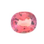 An oval-shape pink sapphire.