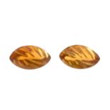 Two fancy-shape citrine cabochons.