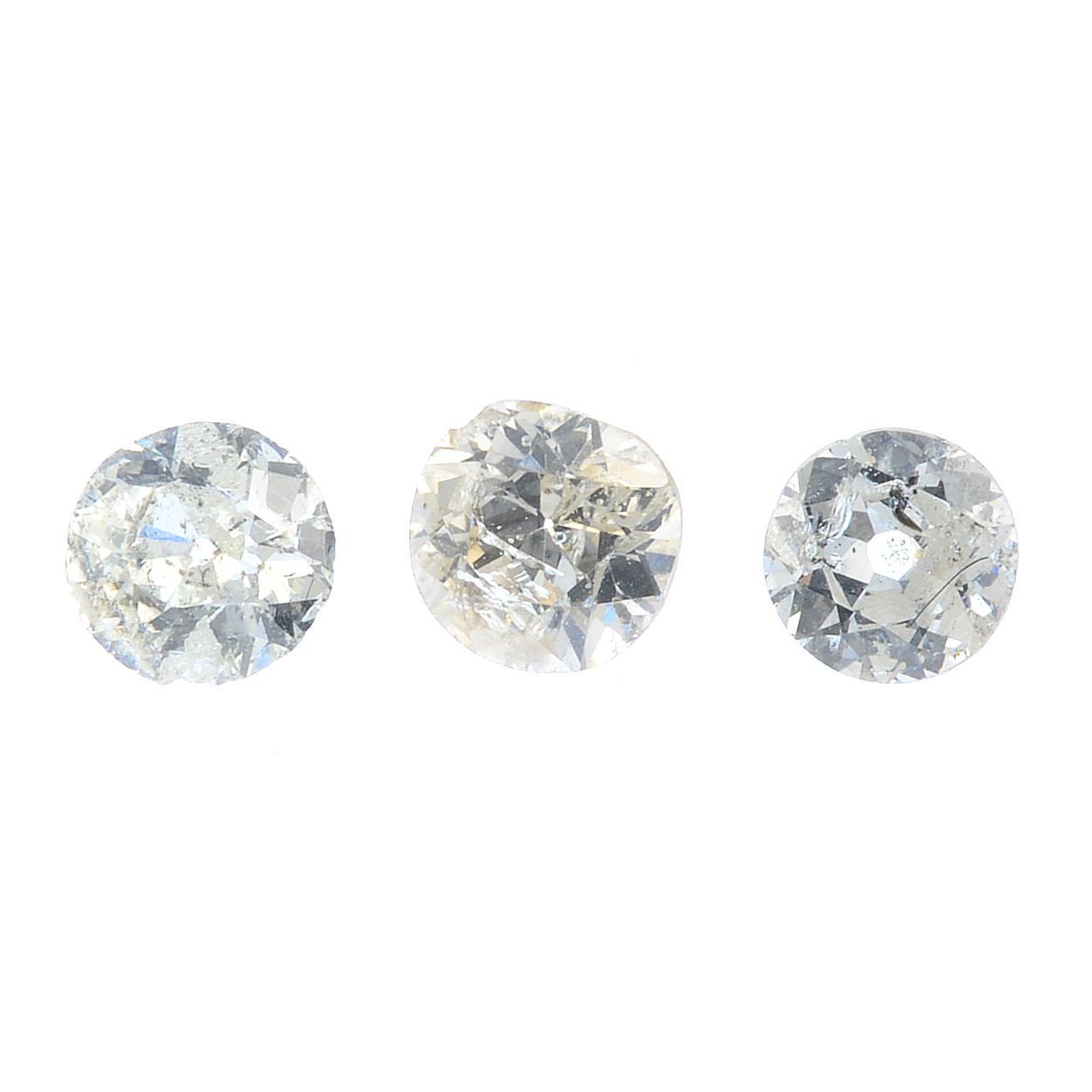 Four vari-cut diamonds.