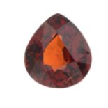 A pear-shape spessartine garnet.