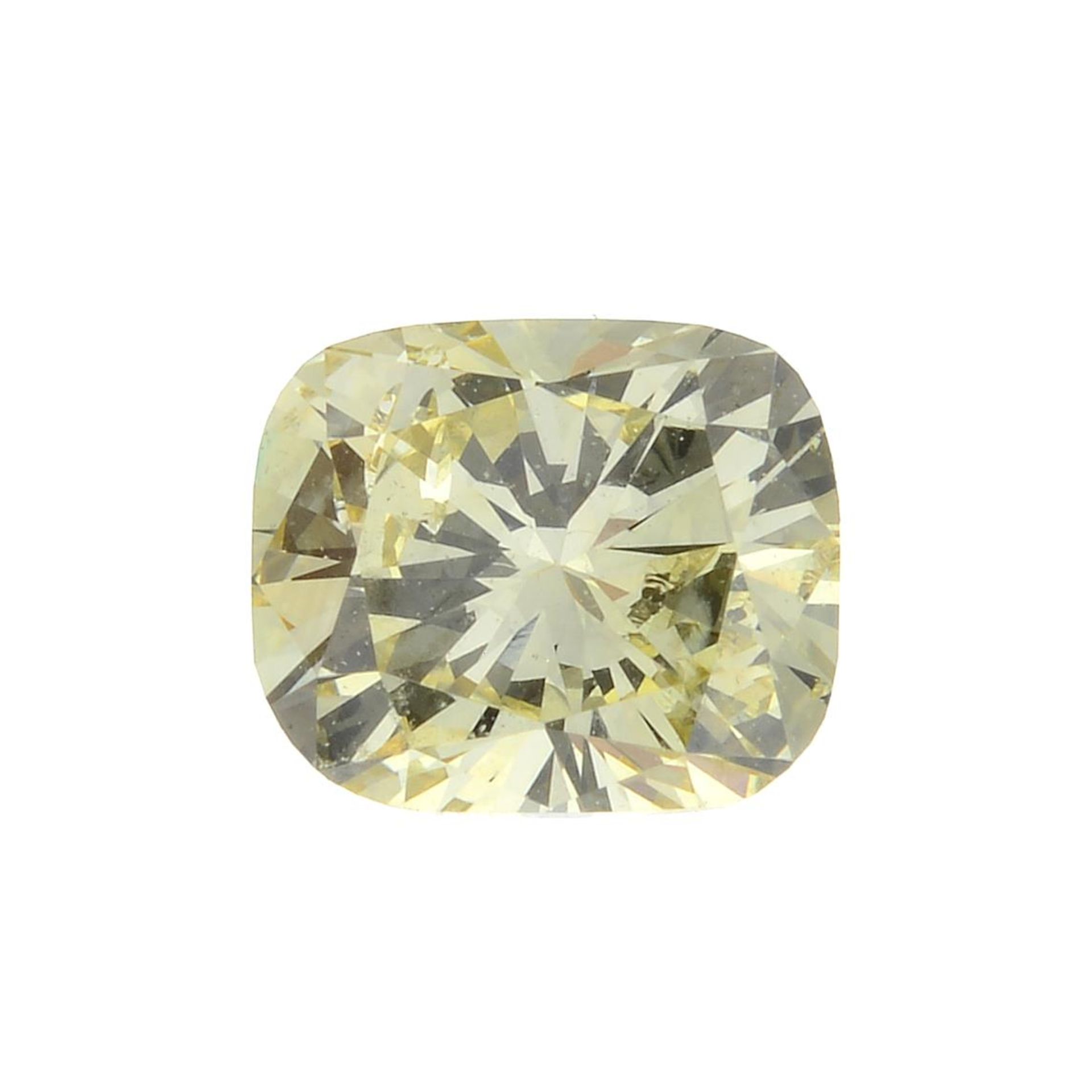 A cushion-shape fancy yellow diamond.
