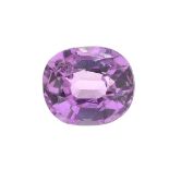 An oval-shape pink sapphire.