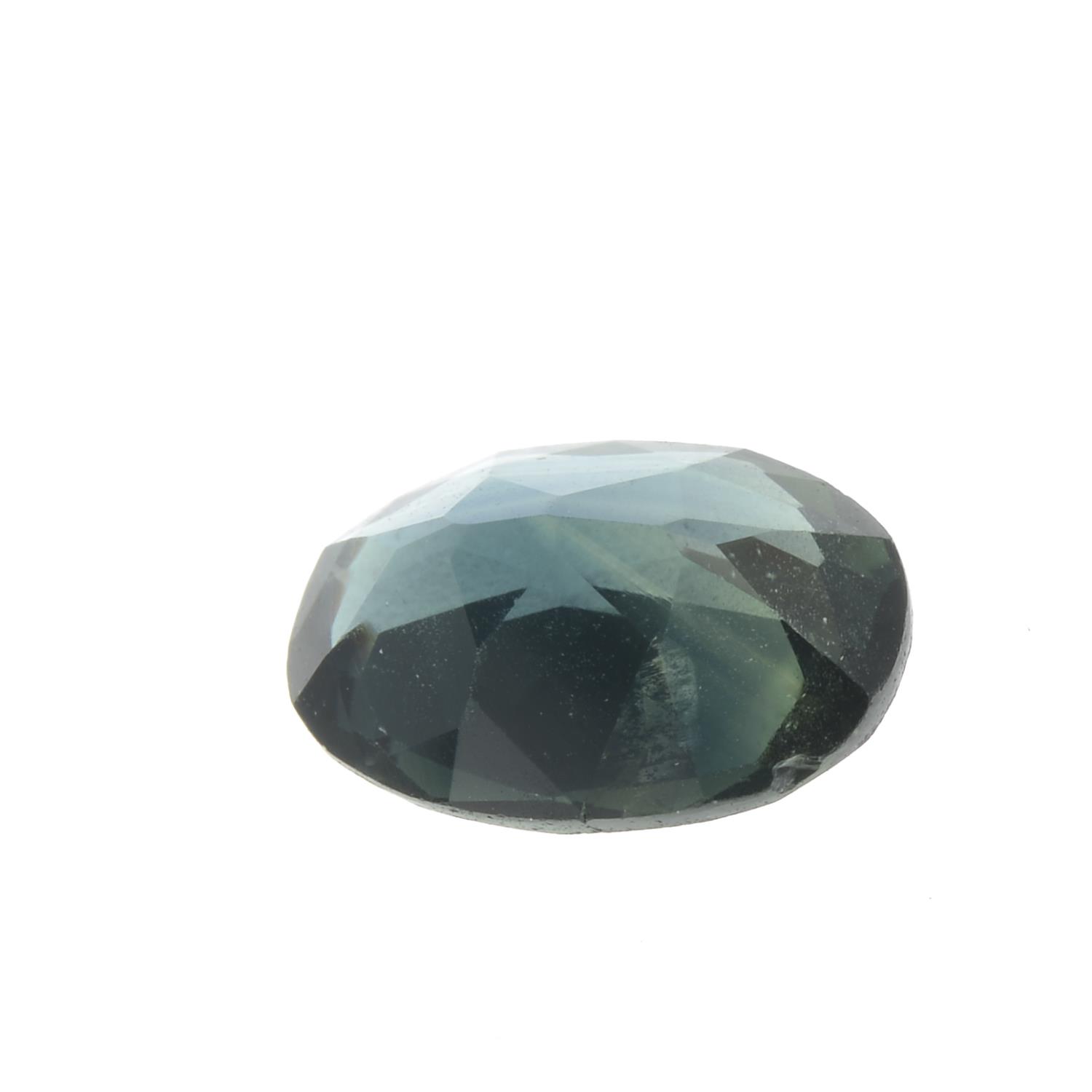 An oval-shape sapphire. - Image 2 of 2