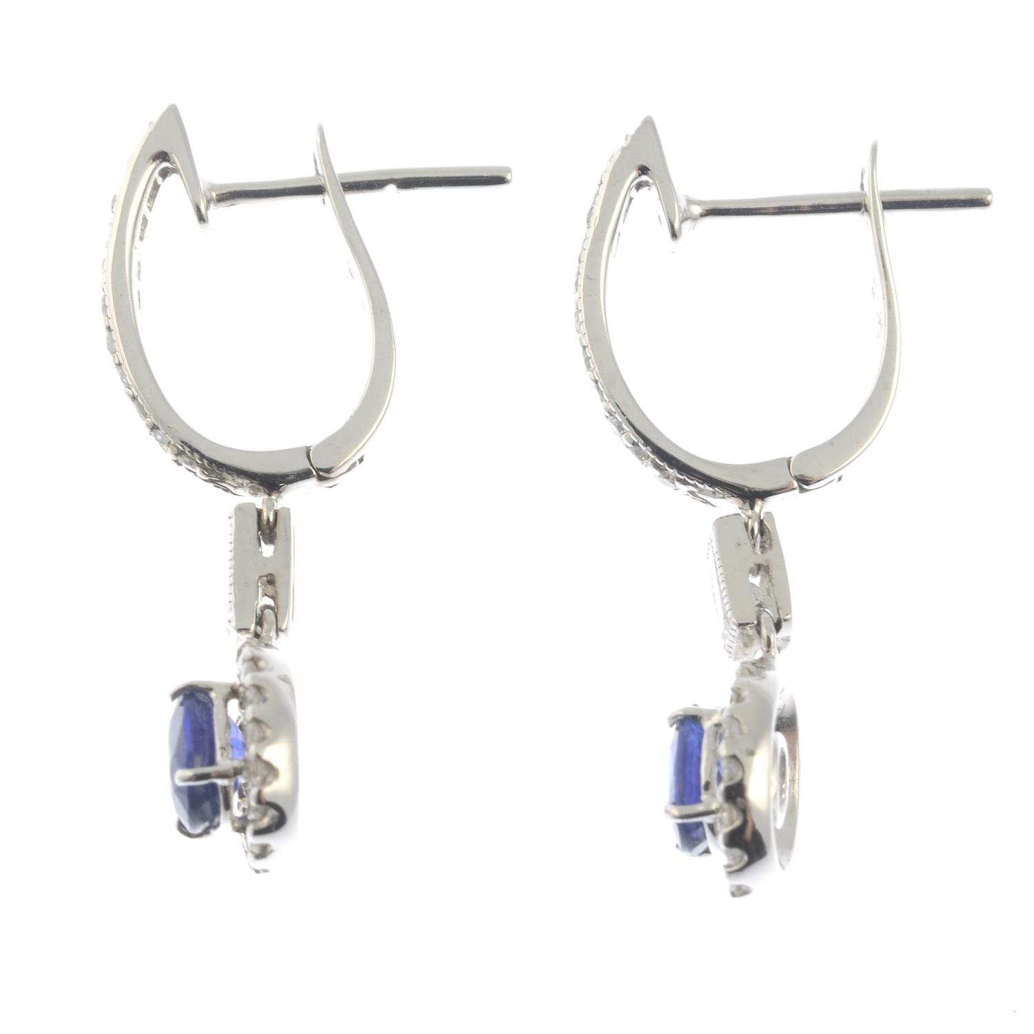 A pair of sapphire and diamond drop earrings.Estimated total diamond weight 0.60ct. - Image 2 of 2