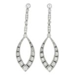 A pair of vari-cut diamond drop earrings.Estimated total diamond weight 1.15cts.Length 5.2cms.