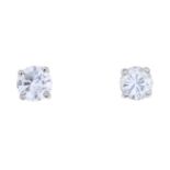 A pair of diamond stud earrings.Estimated total diamond weight 0.85ct, H-I colour, SI2-P1 clarity.