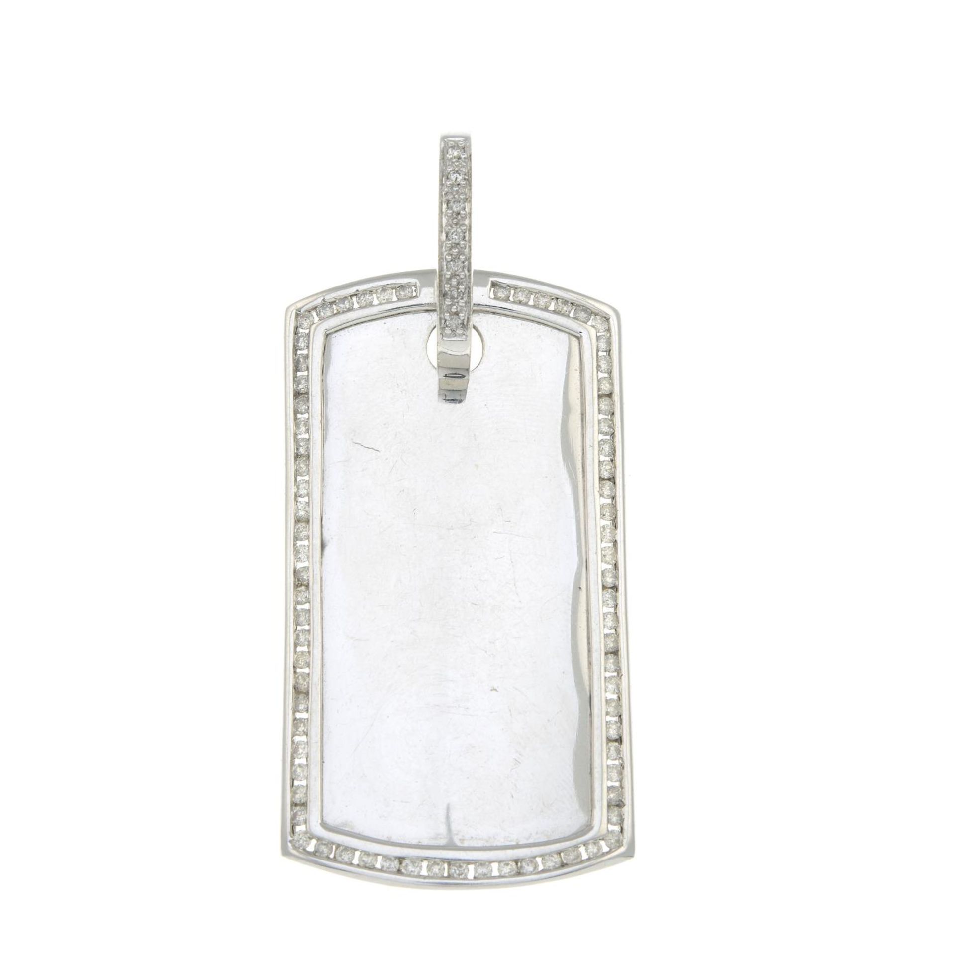 A brilliant-cut diamond tag pendant.Estimated total diamond weight 0.85ct.Length 6.5cms.