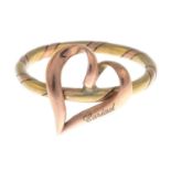 A 'Cariad' heart ring, by Clogau.Signed Clogau.