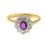 An 18ct gold ruby and brilliant-cut diamond cluster ring.Estimated total diamond weight 0.25ct,