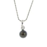 An 18ct gold cultured pearl and diamond pendant, with chain.Pendant with hallmarks for 18ct gold.