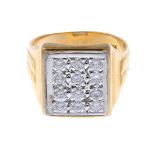 An 18ct gold diamond cluster signet ring.