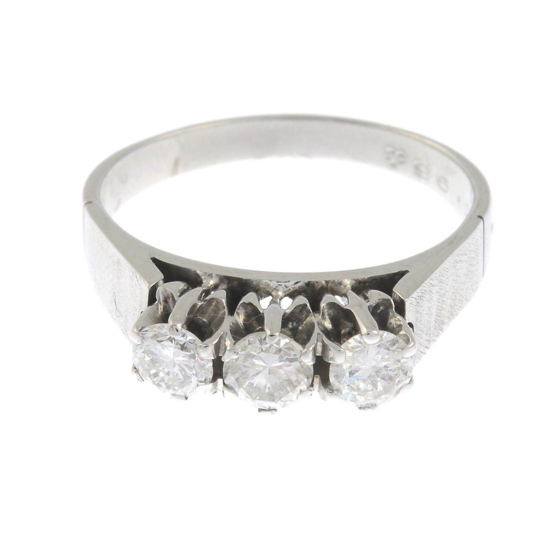 A brilliant-cut diamond three-stone ringTotal diamond weight 0.96ct,