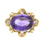 A late Victorian 15ct gold amethyst and split pearl brooch.Approximate dimensions of amethyst 22 by