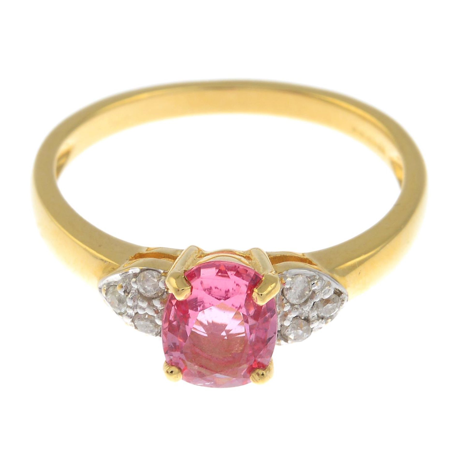 An 18ct gold orangish-pink sapphire and briliant-cut diamond dress ring.Sapphire weight