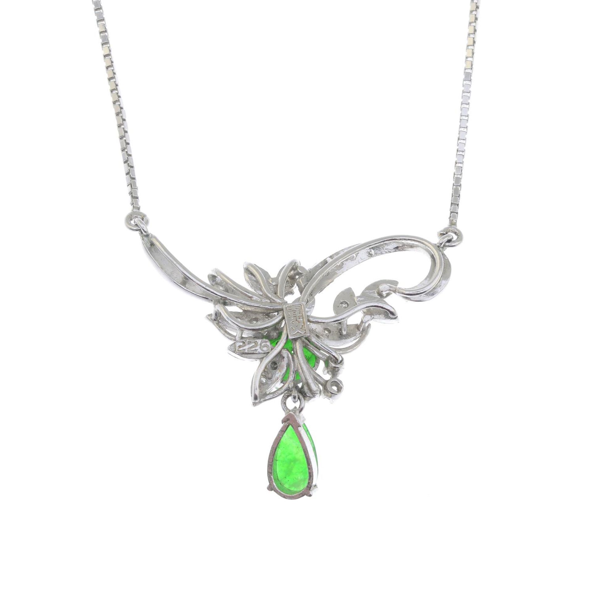 A jadeite and diamond floral pendant, on a box-link chain.Estimated total diamond weight 0.10ct. - Bild 2 aus 2