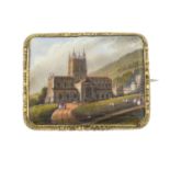 An early 20th century pinchbeck enamel brooch, depicting a church.Length 5cms.