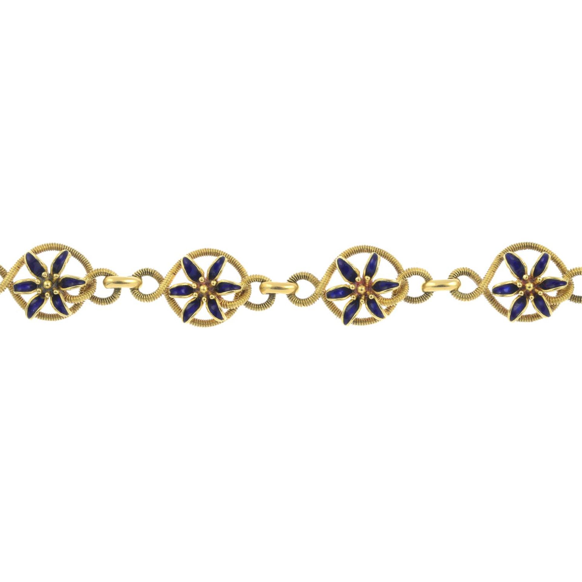 An enamel floral bracelet.