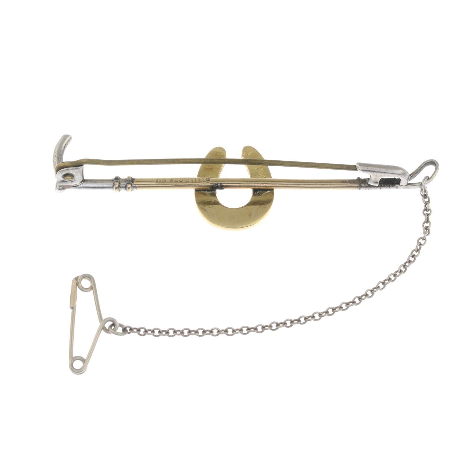 An early 20th century 9ct gold and silver riding crop brooch, - Image 2 of 2