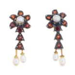 A pair of garnet and seed pearl floral earrings.Length 2.6cms.