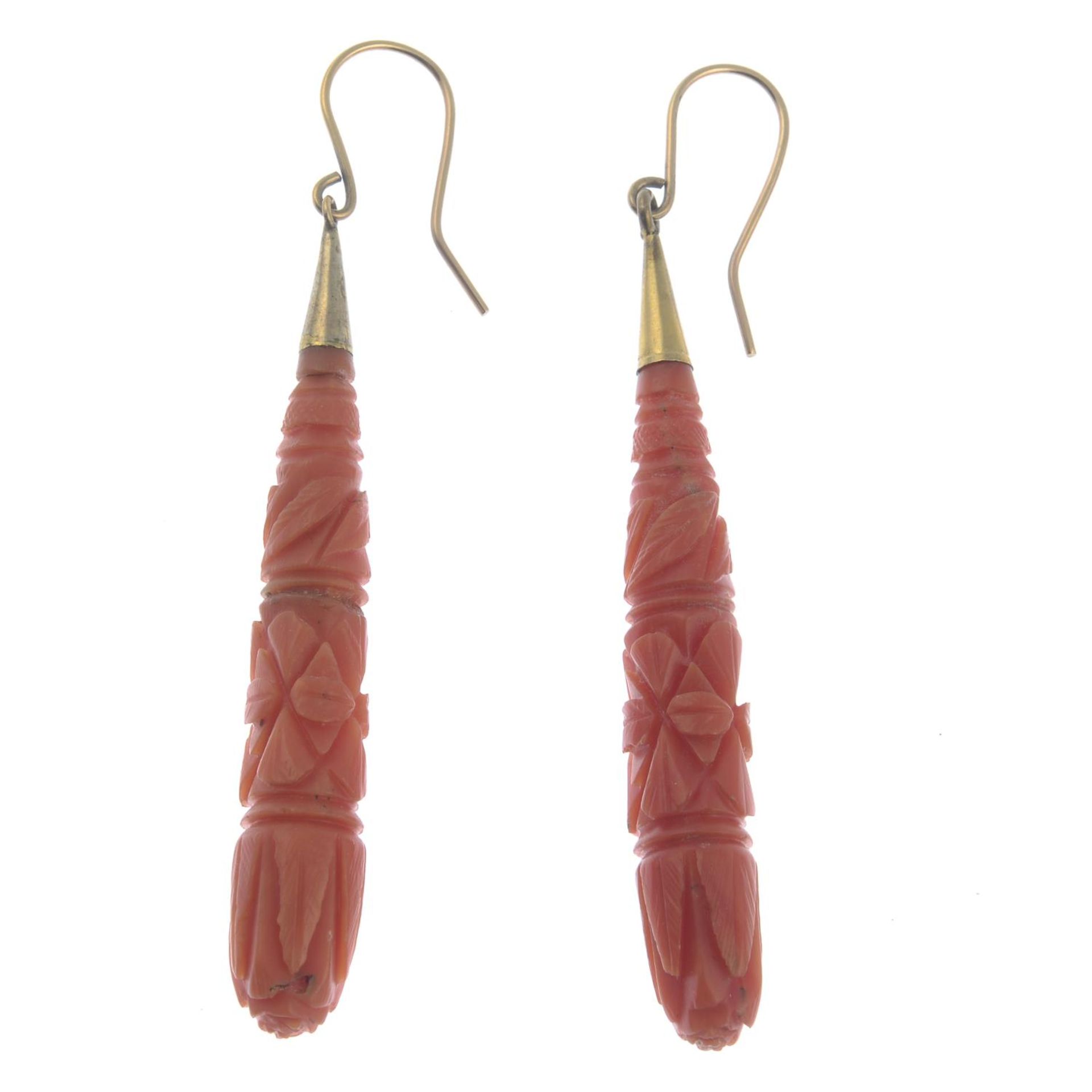 A pair of late 19th century gold carved coral earrings.Coral untested.Length 6.6cms. - Bild 2 aus 2