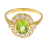 A peridot and vari-cut diamond dress ring.Peridot weight 1.30cts.Total diamond weight