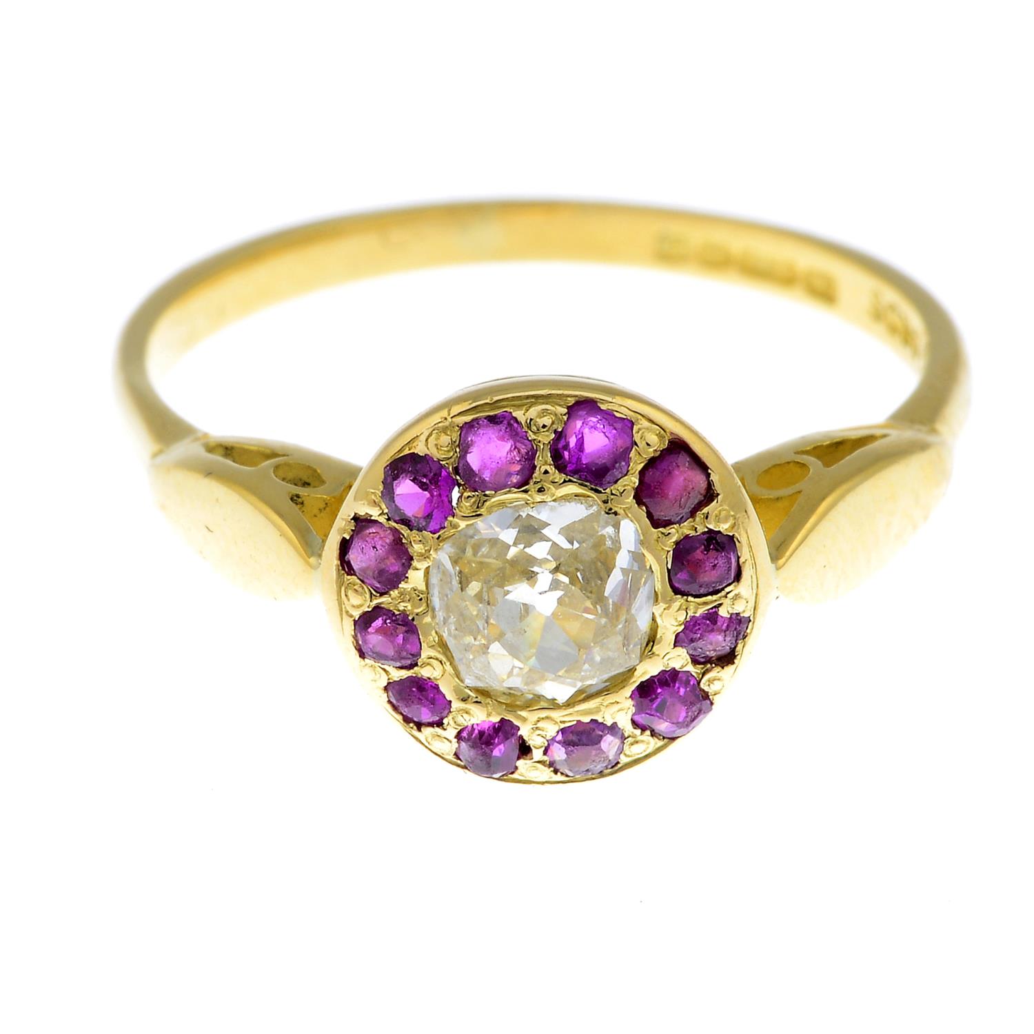 An 18ct gold old-cut diamond and ruby cluster ring.Estimated diamond weight 0.40ct,