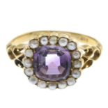 An amethyst and seed pearl ring.Stamped 18ct.Ring size P.