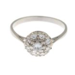 A diamond cluster ring.Estimated total diamond weight 0.45ct,