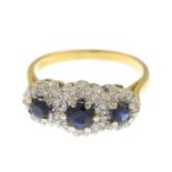 A sapphire and single-cut diamond triple cluster ring.Estimated total diamond weight 0.20ct.Stamped