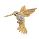 A brilliant and single-cut diamond humming bird brooch.Estimated total diamond weight