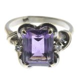 An amethyst and diamond dress ring.