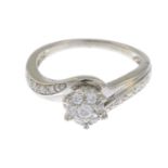 A 9ct gold brilliant-cut diamond dress ring.Total diamond weight 0.25ct,