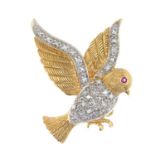 A diamond and ruby bird brooch.Estimated total diamond weight 0.20ct.