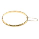 A 9ct gold bangle.Hallmarks for 9ct gold.