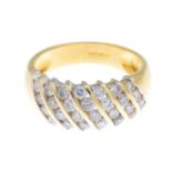 An 18ct gold diamond dress ring.Total diamond weight 1.01cts, stmaped to band.